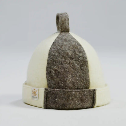 A cream and dark gray felt sauna hat with a top loop and adjustable cuff, shown on a light gray background.